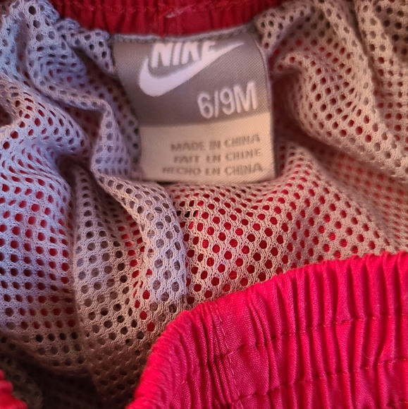 NIKE red lined splash pants - Picture 3 of 3